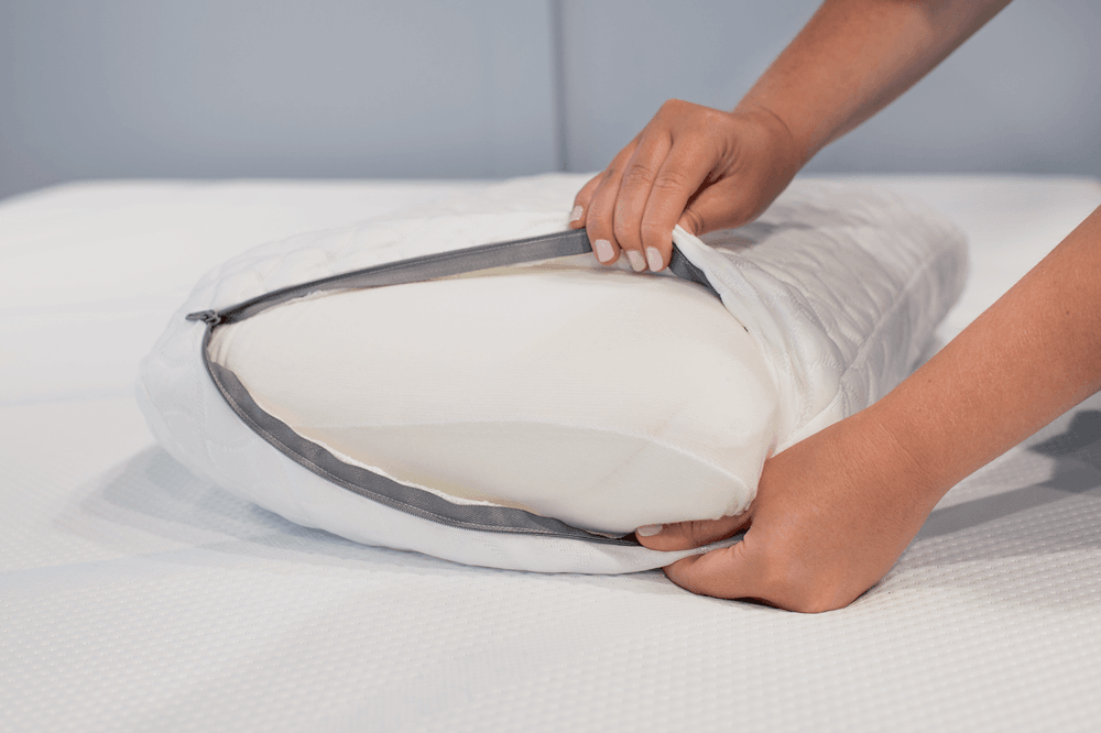 the washable cover being removed from a tempur cloud pillow