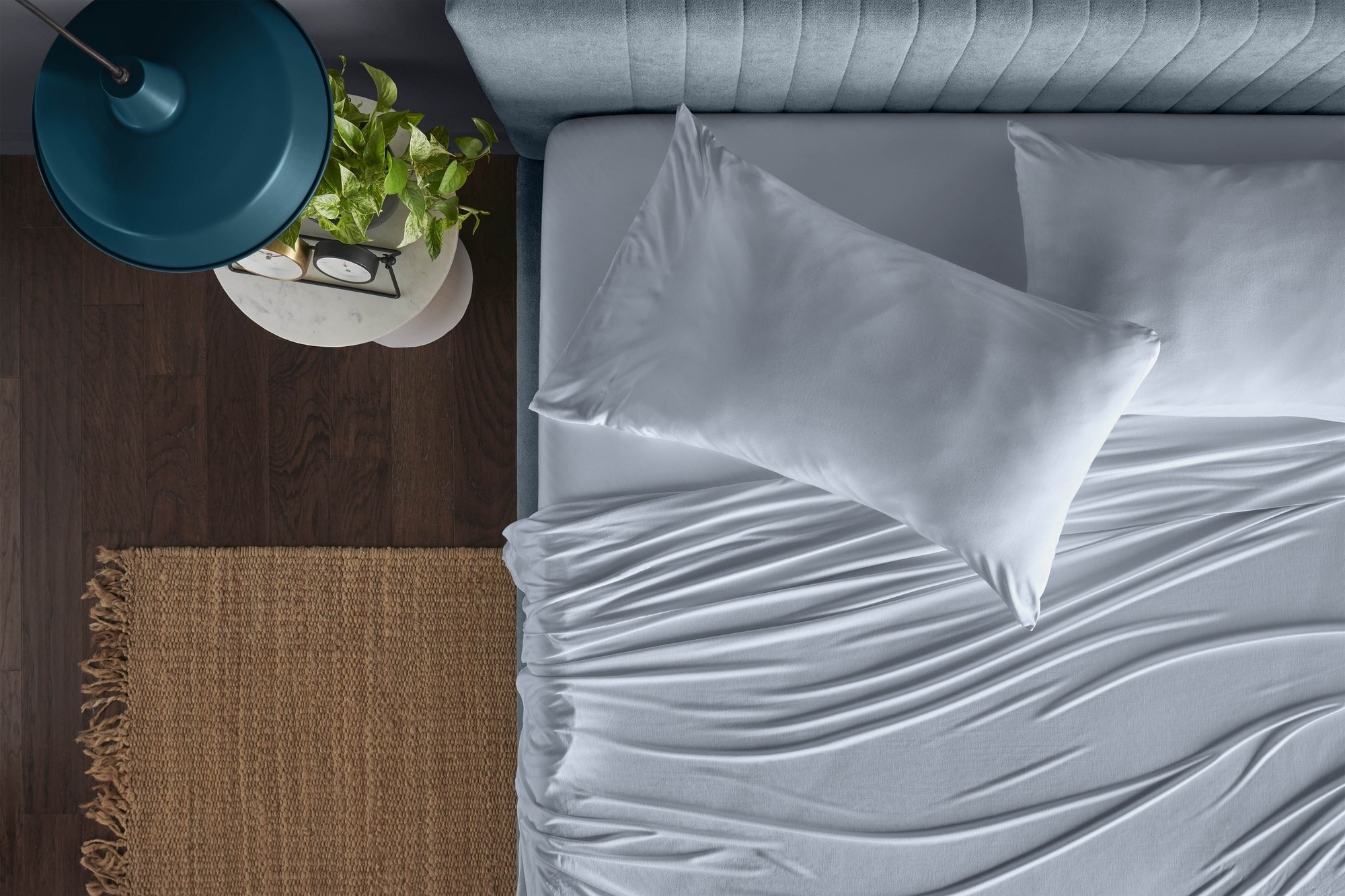sleepy blue sheets on a bed